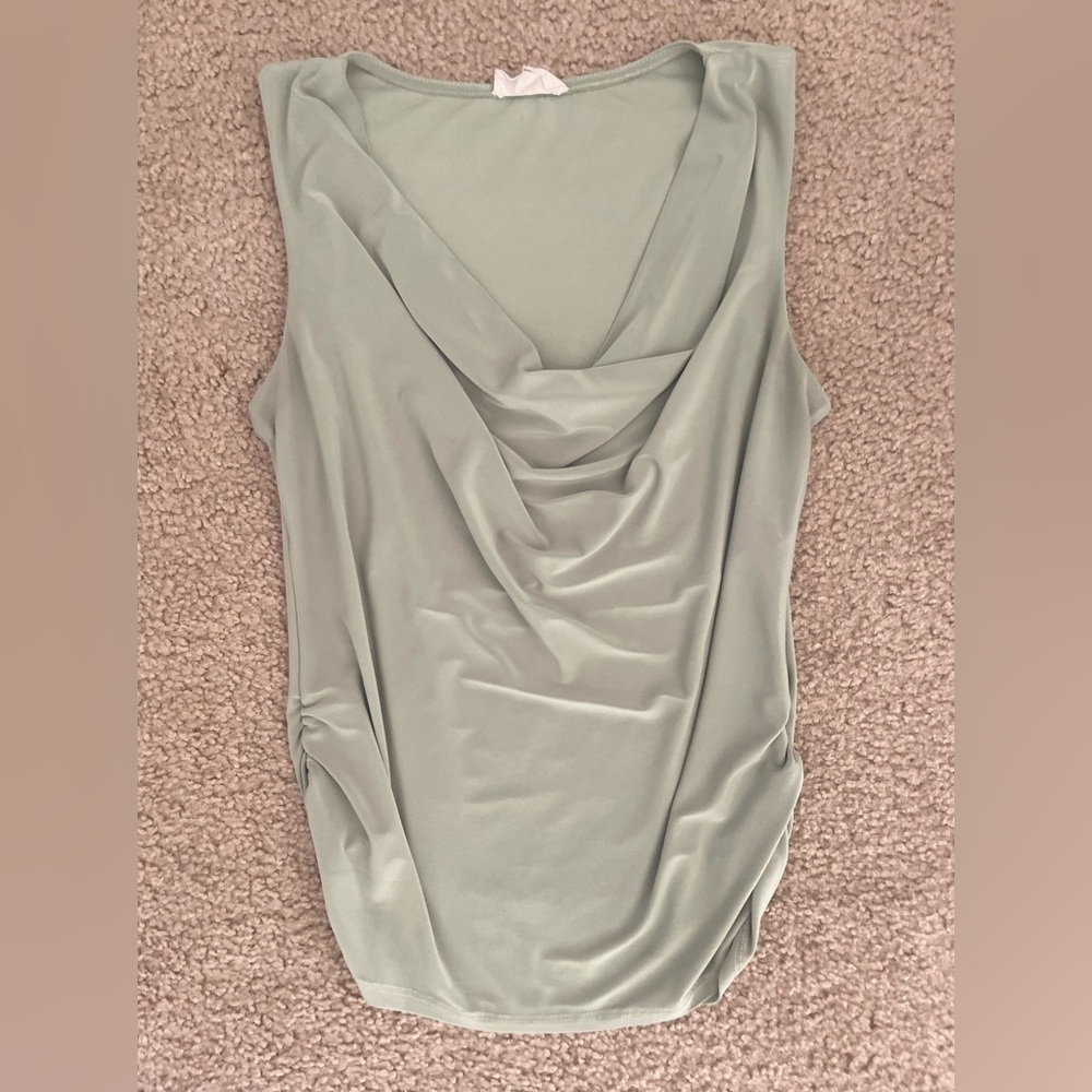 Mint green sleeveless blouse, office attire